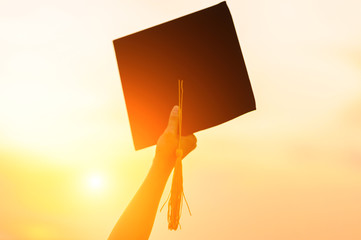Graduates wear a black hat to stand for congratulations on graduation
