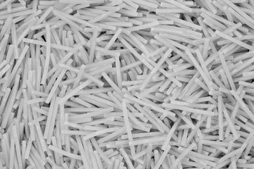 white small pasta texture background closeup. vermicelli.  raw small noodles