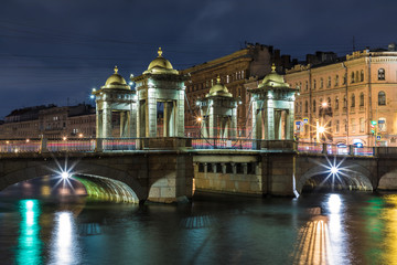 Saint Petersburg, Russia - October 19 2019: Lomonosov movable  stone Bridge across the Fontanka River in the night