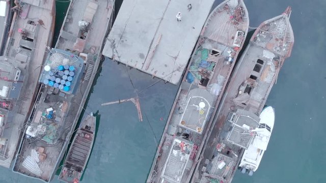 aerial professional drone view of fisherman port with morning fog Dalian, China, 19-6-19