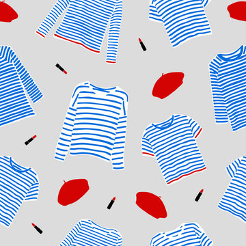 Seamless pattern with and drawn blue striped longsleeve t-shirts, red berets and lipsticks.