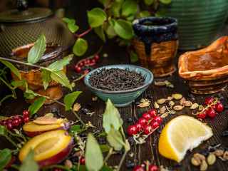 Preparation of the tea ceremony, tea in the bowl. Handmade cups