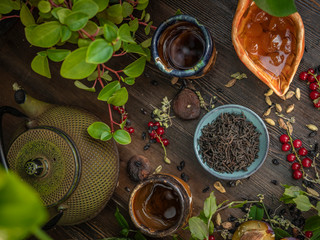 Preparation of the tea ceremony, tea in the bowl. Handmade cups