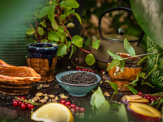 Preparation of the tea ceremony, tea in the bowl. Handmade cups