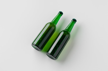 Green longneck beer bottle mockup. Two bottles.