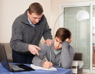 Father unhappy with how teenage son learns
