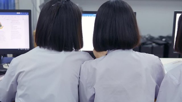 High school students are studying computers, Thailand, southeast Asia.