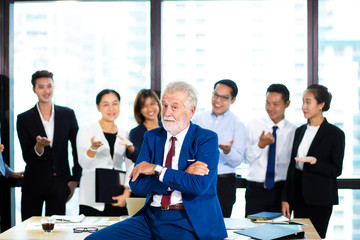 business teamwork concept. Group of business people with businessman leader on foreground