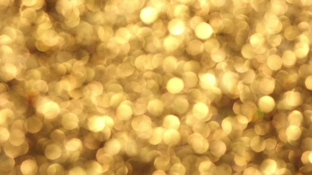 Fondo abstracto de luces doradas desenfocadas