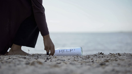 Woman finds message Help in bottle, chance to save survivors, find missed people