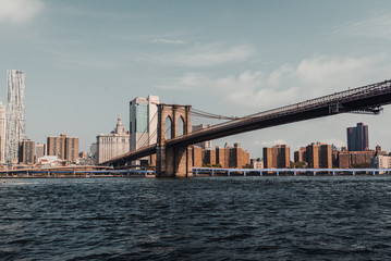 Fototapeta na wymiar Panoramic view of the Brooklyn Bridge from the Dumbo riverside