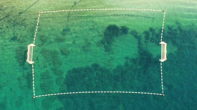 Abstract aerial view of water polo field, Sumartin, Brač island, Croatia.