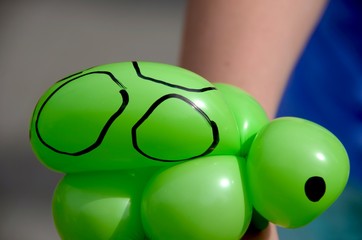 Turtle made from vibrant green balloon
