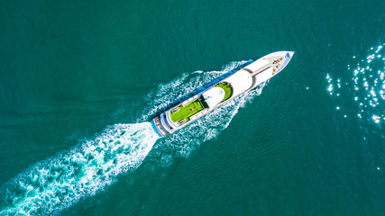 Aerial view of beautiful large white Cruise ship, Top view from drone of yacht,  Luxury cruise.
