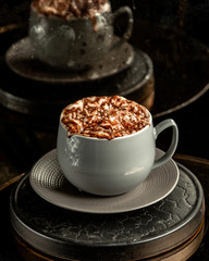 cappuccino with nuts on the table