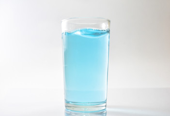 Water blue and air bubbles over white background 