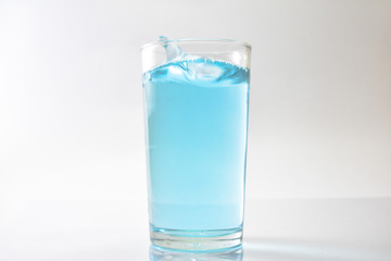 Water blue and air bubbles over white background 
