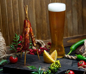chicken kebab with beer mug