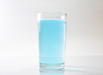 Water blue and air bubbles over white background 