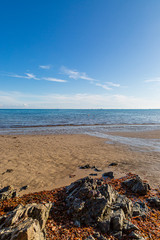 Looking out over the beach towards the sea, at Gorey on the Island of Jersey
