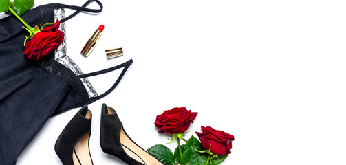 Female black T-shirt jacket with lace, classic shoes, red lipstick and rose flowers on white...