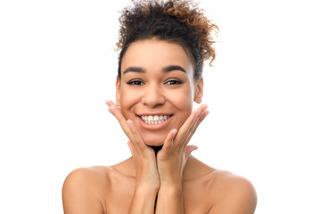 Skin care. Afro woman with perfect skin posing to camera
