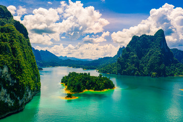 Beautiful mountain and blue sky with cloud in Khao Sok National park locate in Ratchaprapha dam in Surat Thani province, Thailand.