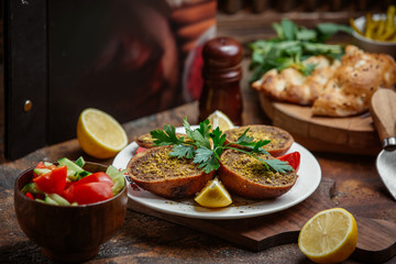 fried main course with vegetables on the table