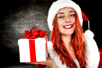 Slim young woman and christmas time 