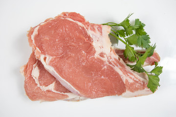 raw veal chopped on a white background