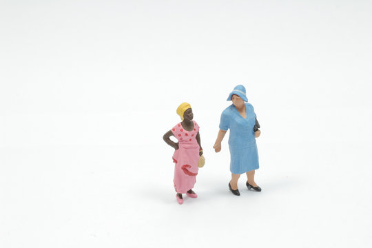 mini figure of feamale stand on board. The mini figure of feamale