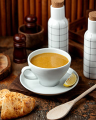 lentil soup with bread on the table