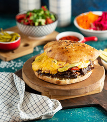 meat doner with cheese and vegetables in pita bread