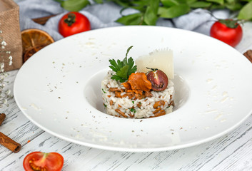 mushroom truffle risotto garnished with parmesan and parsley