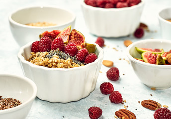 oatmeal for breakfast with raspberries, nuts and seeds
