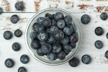 A glass bowl with blueberry