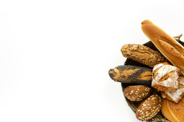 assorted  homemade bread on dark wood background