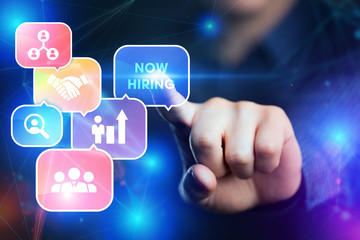 The concept of business, technology, the Internet and the network. A young entrepreneur working on a virtual screen of the future and sees the inscription: now hiring.