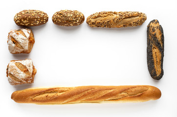 assorted  homemade bread on dark wood background