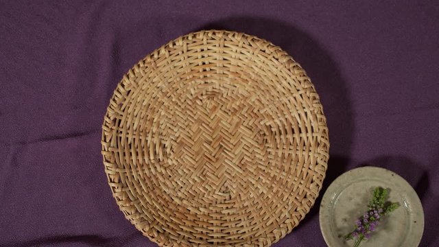 a Japanese female chef putting ingredients on her kitchen table, Tokyo, Japan. July 2019. Camera fixed, close up, bird's eye view