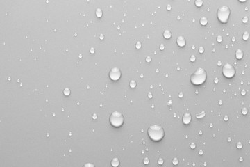 Drops of water on a color background