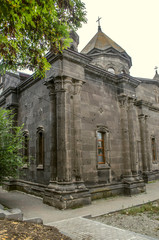 The rear east corner of the Church "Seven Sorrows of the Blessed Virgin" bearing classical columns on the sides in Gyumri