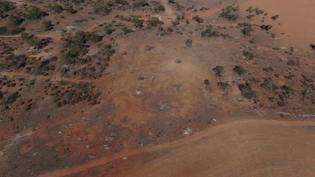 Aerial view of a wide drout and dry wide field from country side 