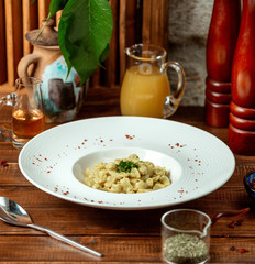 azerbaijani dumplings dushbara served with vinegar and dried mint