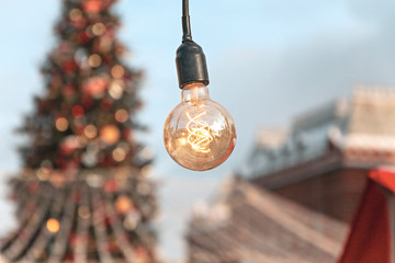 Beautiful retro luxury light lamp decor glowing with christmas tree on background