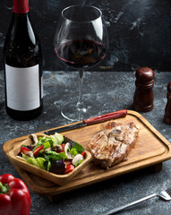 slightly grilled lamb steak served with mushroom, strawberry, bell pepper, lettuce salad