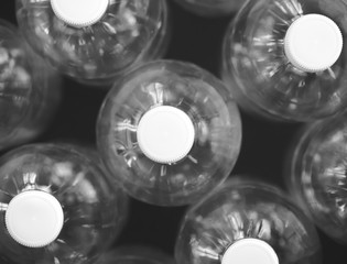 plastic water bottle on black background