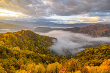 The mountain autumn landscape with colorful forest. Caucasus mountains in autumn. Russia, Lago Naki.