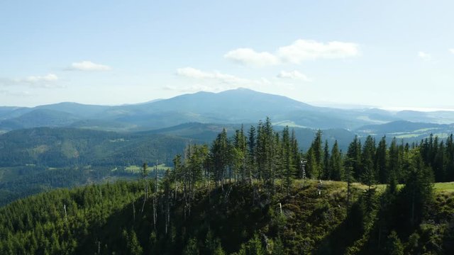 Drone reveal of Babia Mountain - the highest mountain of Beskid Mountains in Carpathians range in sunny summer day.