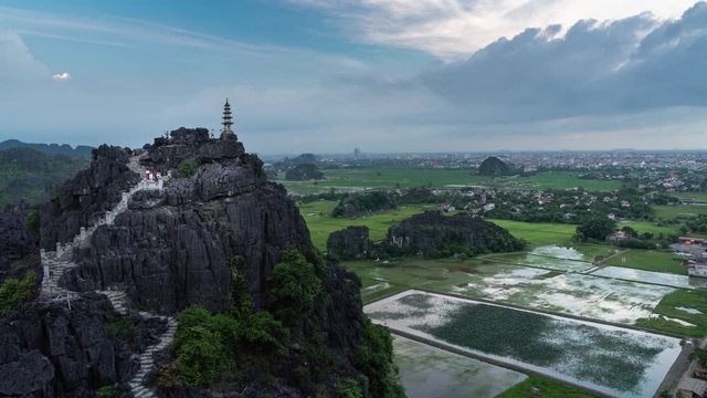 Timelapse, Tam Coc, Mua Cave. Zoom In Temple Mountain with an impressive view at Sunset. Landmark in Ninh Binh. 